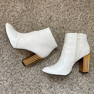 White booties with gold heel
